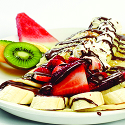 Crêpes with fruits and ice cream
